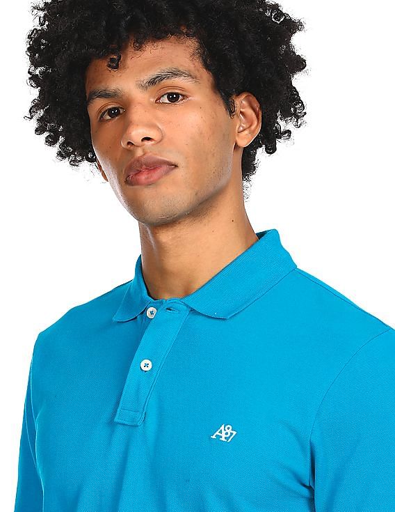 Aeropostale Men Turquoise Cotton Appliqued Logo Polo Shirt