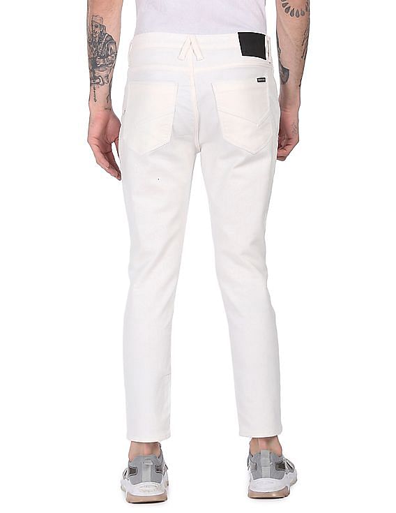 Buy Arrow Newyork Men White Mid Rise Carson Cropped Slim Fit Jeans