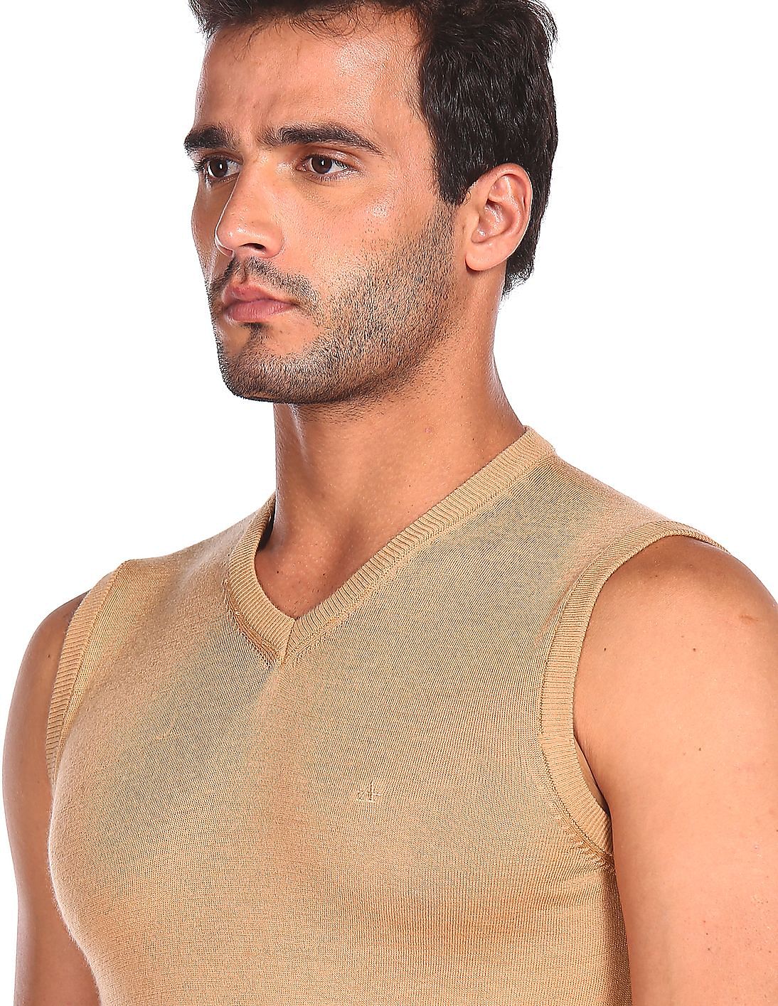 Buy Arrow Men Beige Sleeveless Solid Merino Wool Sweater - NNNOW.com