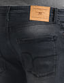 Flying Machine Slash Slim Tapered Fit Jeans