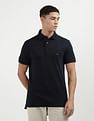 Tommy Hilfiger Solid Logo Slim Fit Polo Shirt