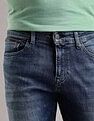 Tommy Hilfiger Medium Washed Relaxed Straight Fit Mid Rise Jeans