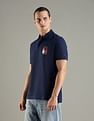 Tommy Hilfiger Solid Regular Fit Cotton Polo T-Shirt