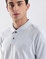 Calvin Klein Jeans Regular-Fit Solid Cotton Polo Shirt