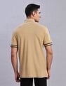 Tommy Hilfiger Mens Beige Solid Polo Shirt