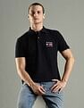 Tommy Hilfiger Solid Regular Fit Cotton Polo T-Shirt
